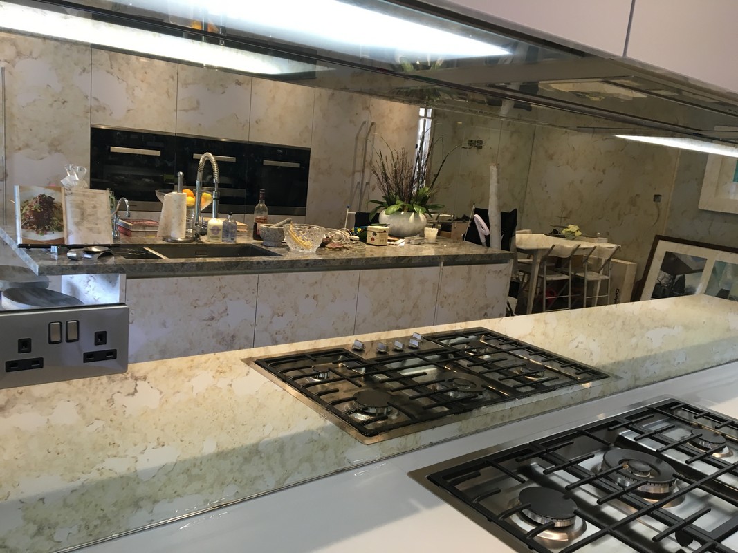 Mirror glass splashback in Aylesbury luxury kitchen