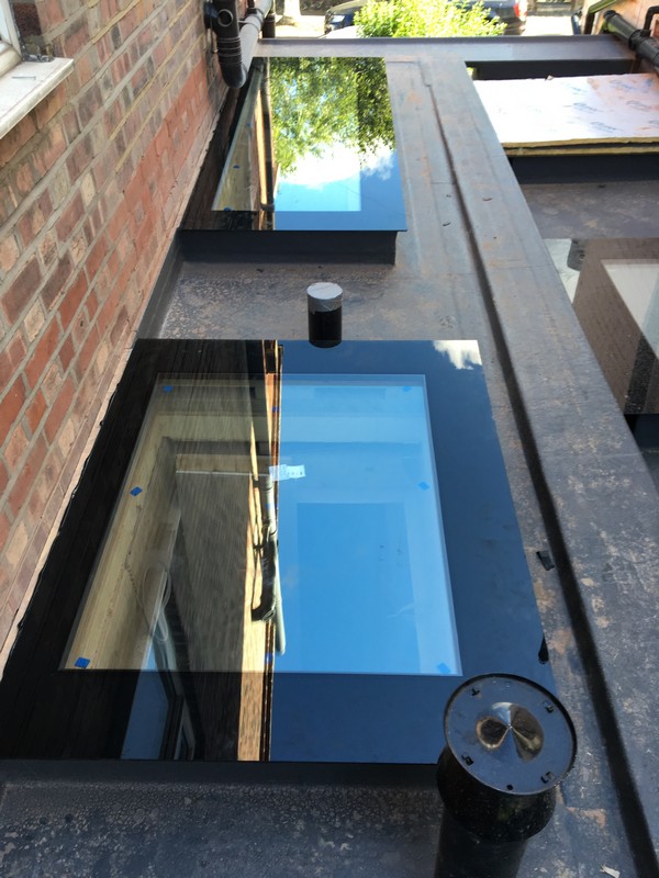 Multiple flat roof skylights on extension in Aylesbury