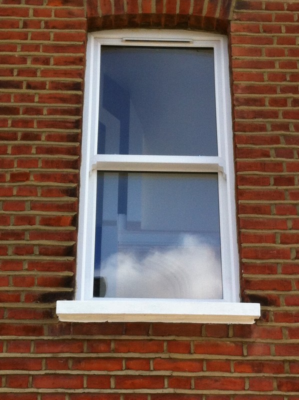 uPVC sash window on Victorian red brick house in Aylesbury